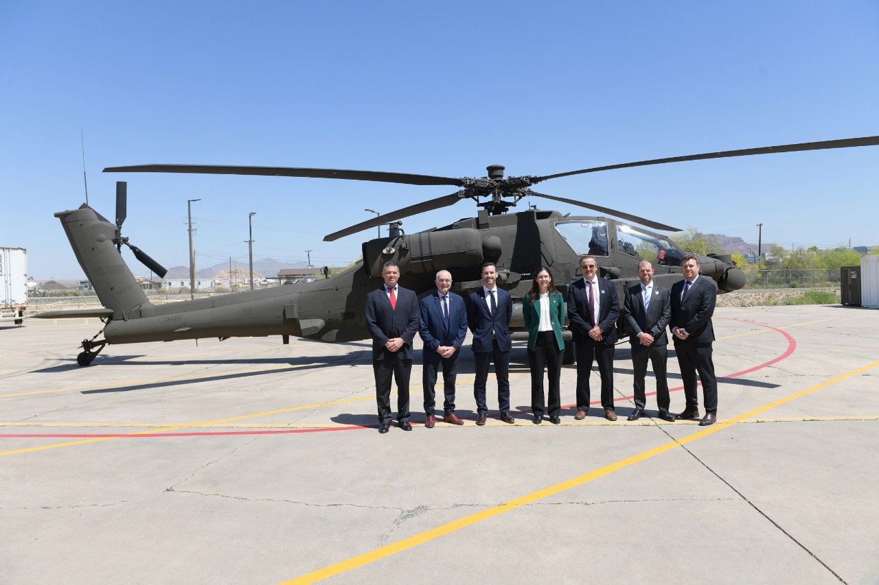 Boeing Defence Australia’s Managing Director, Amy List (centre) with representatives from Australian suppliers at the AH-64 Apache production facility, Mesa. 