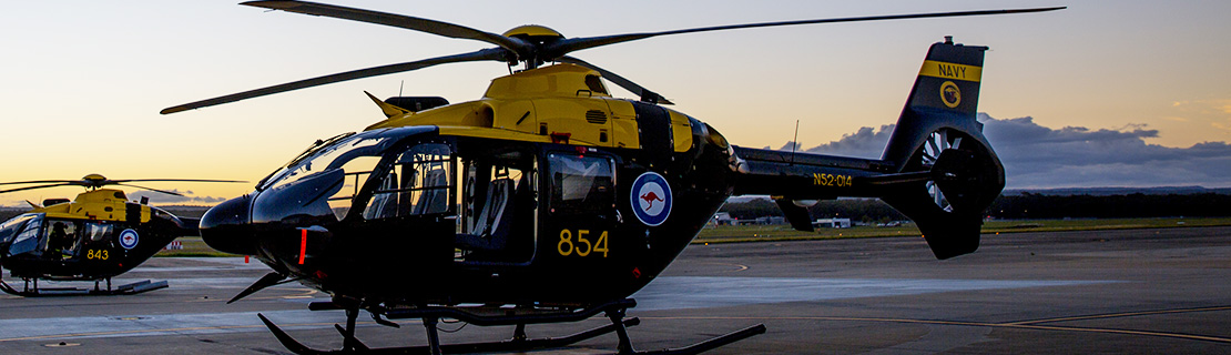 Helicopters on tarmac