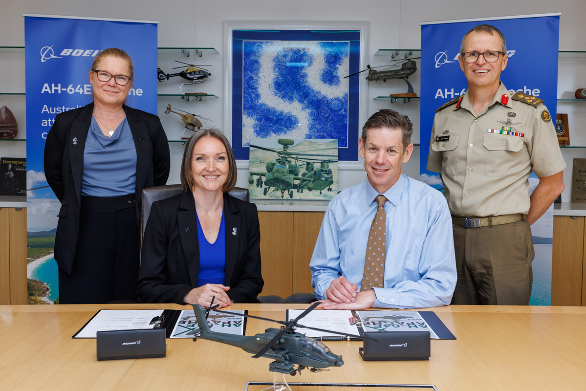 Above (l-r): Boeing Defence Australia (BDA) Sustainment Operations Director Naomi Smith; BDA Board Director Emily Hughes; MAJGEN Jeremy King; and BRIG Andy Thomas, DG Army Aviation Systems Branch, sign the Apache Initial Support Contract in Brisbane.