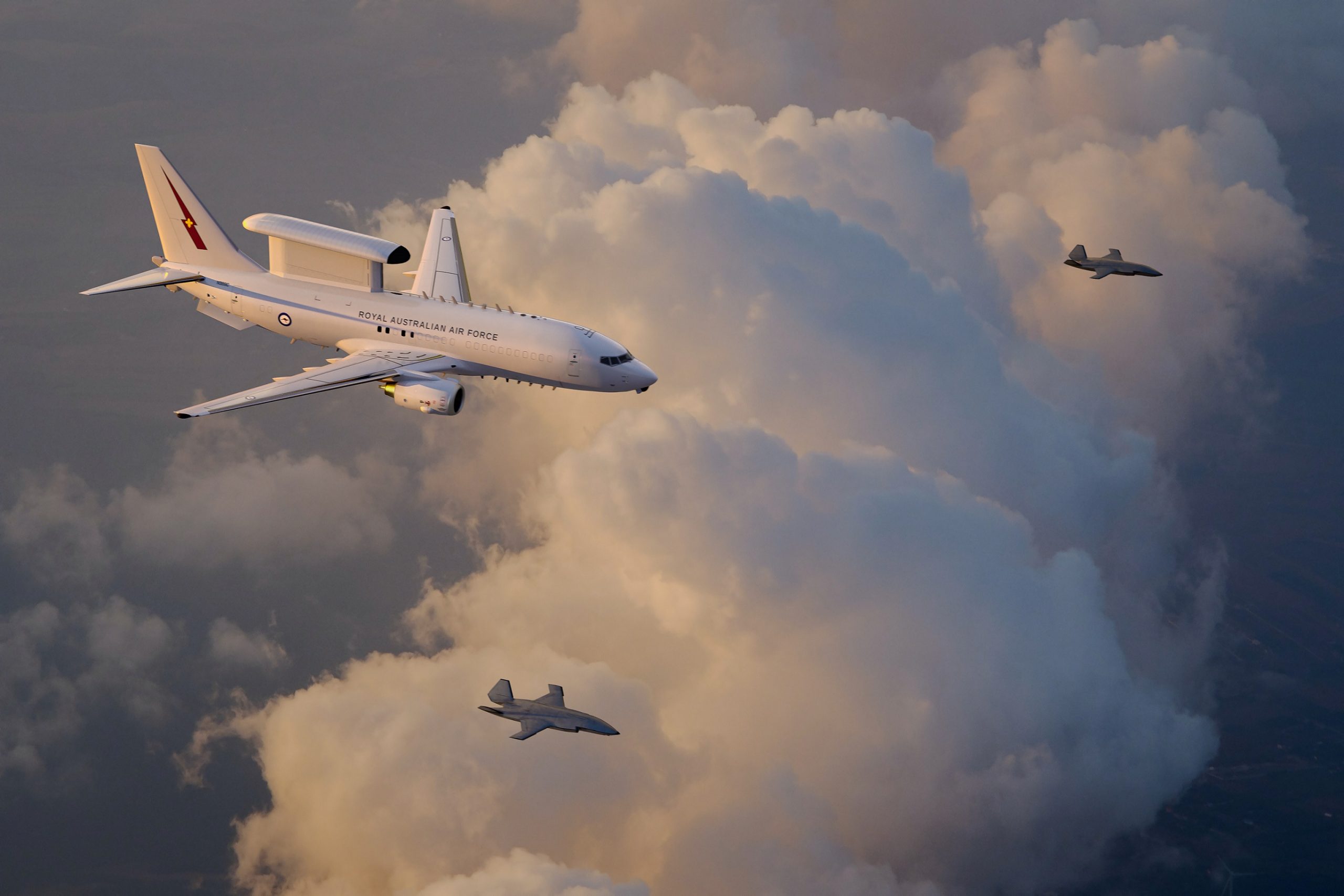 An artist's illustration of a Royal Australian Air Force E-7A Wedgetail teaming with two MQ-28 Ghost Bat collaborative combat aircraft 